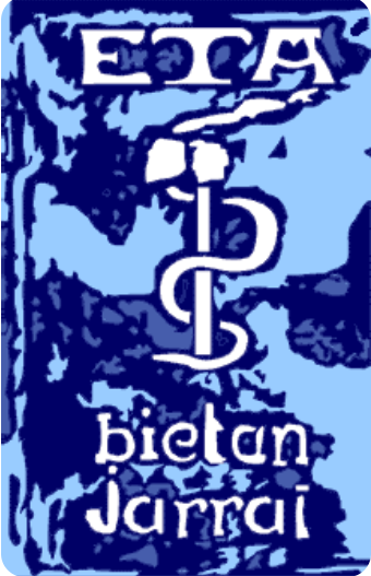 Une représentation murale du logo d’ETA à partir des années 1990 : une hache et un serpent, avec le slogan « continuer dans les deux voies »